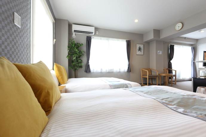 Imagen de la habitación del Hotel Neiraku. Foto 11