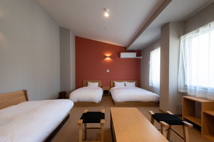 Imagen de la habitación del Hotel Neiraku. Foto 12
