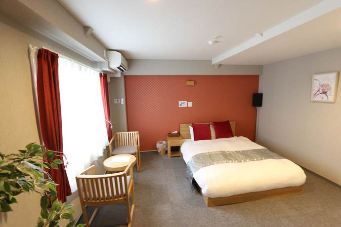 Imagen de la habitación del Hotel Neiraku. Foto 14