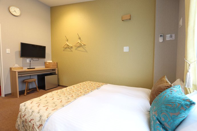 Imagen de la habitación del Hotel Neiraku. Foto 15