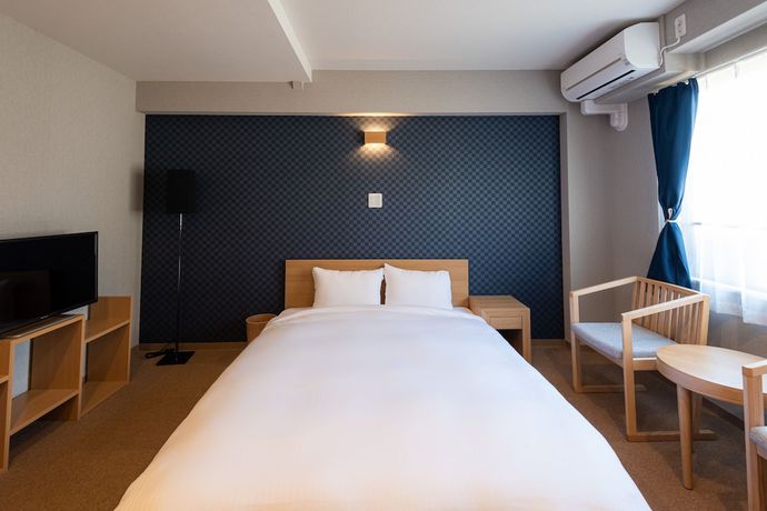 Imagen de la habitación del Hotel Neiraku. Foto 18