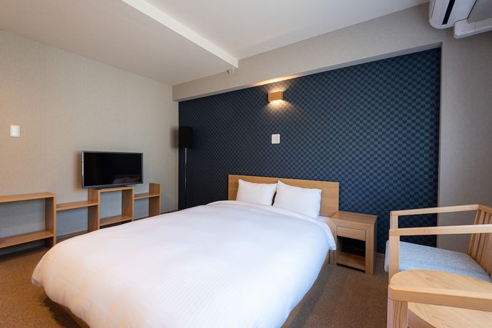 Imagen de la habitación del Hotel Neiraku. Foto 19