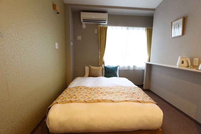Imagen de la habitación del Hotel Neiraku. Foto 20