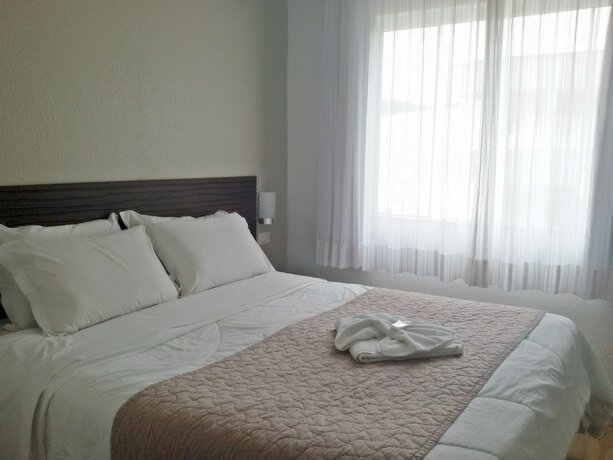 Imagen de la habitación del Hotel Nelo. Foto 14