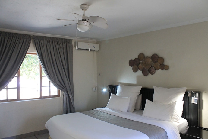 Imagen de la habitación del Hotel Nelspruit Lodge. Foto 7