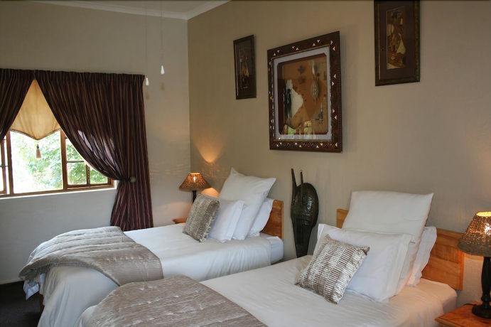 Imagen de la habitación del Hotel Nelspruit Lodge. Foto 13