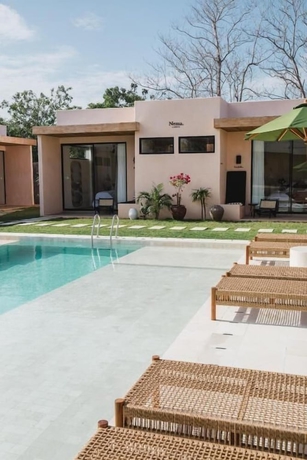 Imagen de la piscina del Hotel Nema Uluwatu. Foto 12