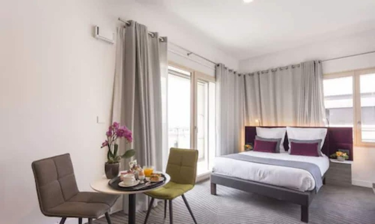 Imagen de la habitación del Hotel Nemea Appart So Cloud Lyon Part Dieu. Foto 12