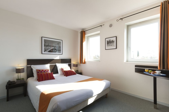 Imagen de la habitación del Hotel Nemea Appart Toulouse Aéroport. Foto 2