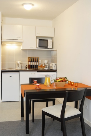 Imagen de la habitación del Hotel Nemea Appart Toulouse Aéroport. Foto 8