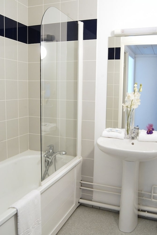 Imagen de la habitación del Hotel Nemea Appart Toulouse Aéroport. Foto 13