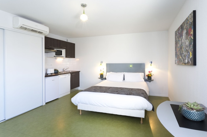 Imagen de la habitación del Hotel Nemea Appart’hotel Toulouse Constellation. Foto 7