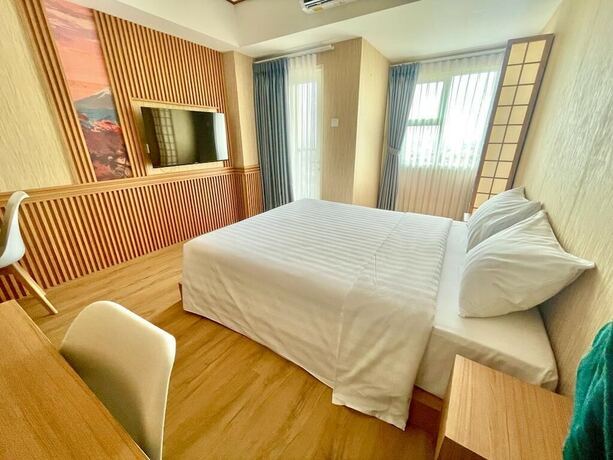 Imagen de la habitación del Hotel Nemuru Ciputat. Foto 27