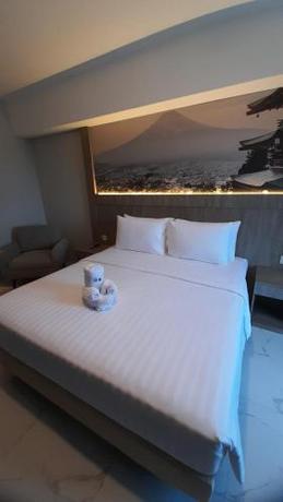 Imagen de la habitación del Hotel Nemuru Grand Suites. Foto 16