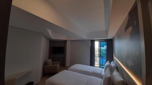 Imagen de la habitación del Hotel Nemuru Grand Suites. Foto 17