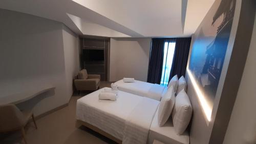 Imagen de la habitación del Hotel Nemuru Grand Suites. Foto 19