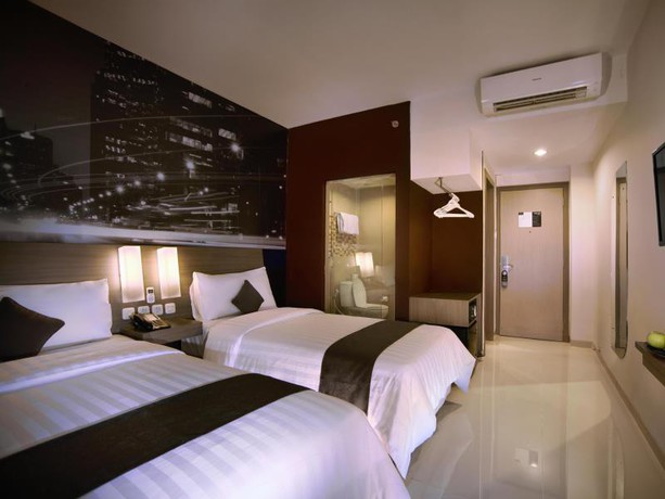 Imagen de la habitación del Hotel Neo Candi Simpang Lima - Semarang By Aston. Foto 3