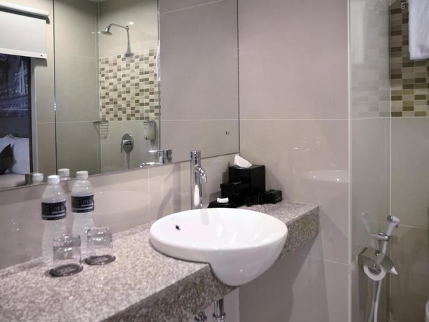 Imagen de la habitación del Hotel Neo Candi Simpang Lima - Semarang By Aston. Foto 4