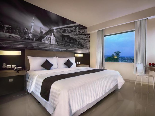 Imagen de la habitación del Hotel Neo Candi Simpang Lima - Semarang By Aston. Foto 6