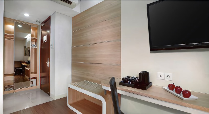 Imagen de la habitación del Hotel Neo Gubeng - Surabaya By Aston. Foto 11