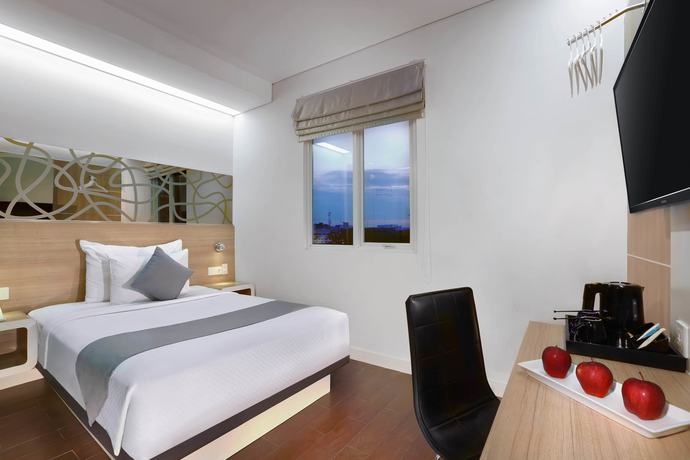 Imagen de la habitación del Hotel Neo Gubeng - Surabaya By Aston. Foto 12
