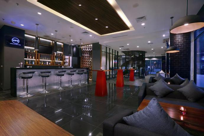 Imagen del bar/restaurante del Hotel Neo+ Kebayoran Jakarta By Aston. Foto 7