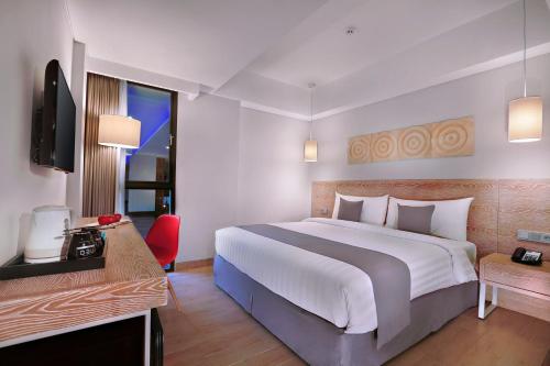 Imagen de la habitación del Hotel Neo + Kuta Legian by ASTON. Foto 3