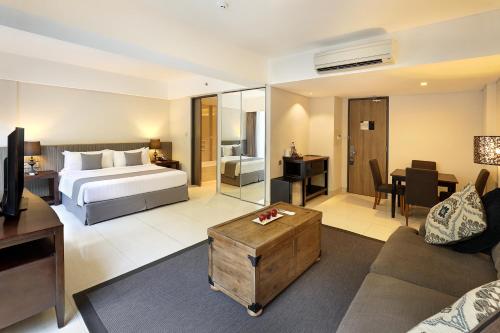 Imagen de la habitación del Hotel Neo + Kuta Legian by ASTON. Foto 5