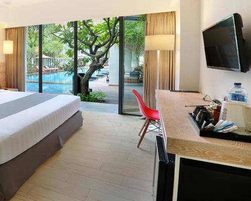 Imagen de la habitación del Hotel Neo + Kuta Legian by ASTON. Foto 9