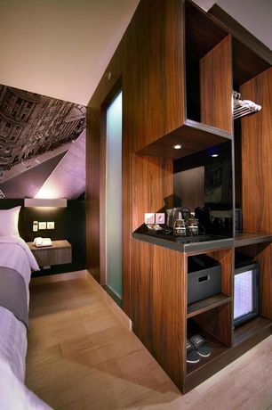 Imagen de la habitación del Hotel Neo Mangga Dua By Aston. Foto 5
