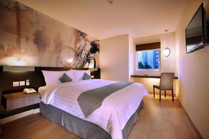 Imagen de la habitación del Hotel Neo Mangga Dua By Aston. Foto 8