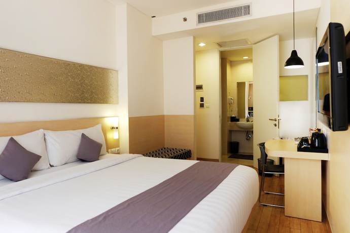 Imagen de la habitación del Hotel Neo Melawai By Aston. Foto 8
