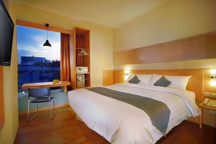 Imagen de la habitación del Hotel Neo Melawai By Aston. Foto 12