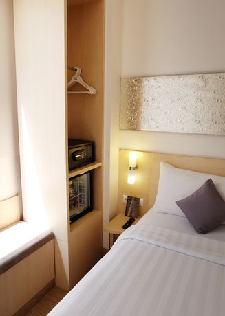 Imagen de la habitación del Hotel Neo Melawai By Aston. Foto 14