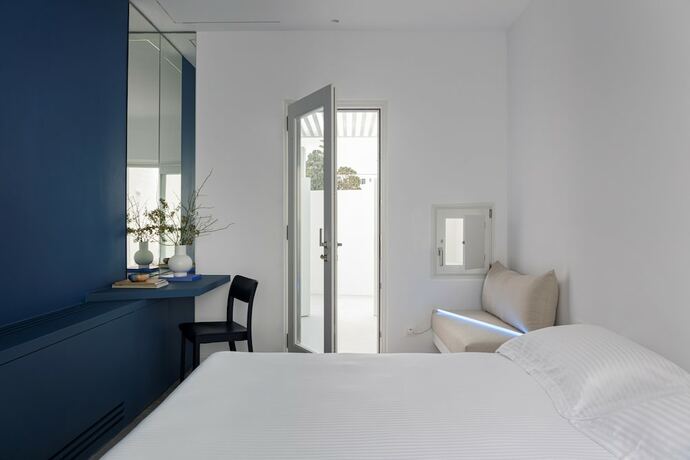 Imagen de la habitación del Hotel Neo Suites. Foto 17