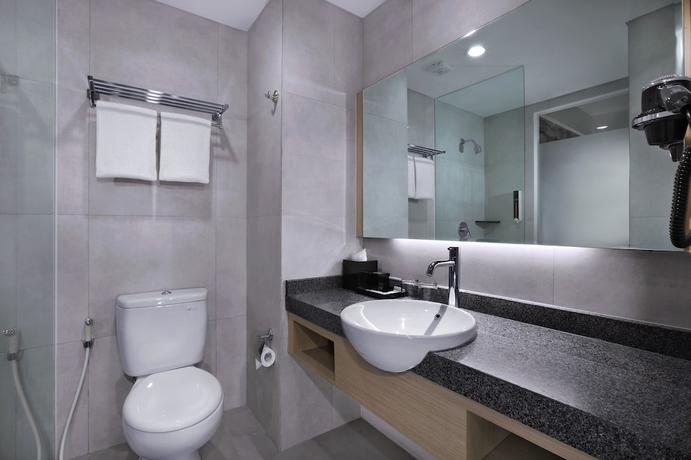 Imagen de la habitación del Hotel Neo+ Waru Sidoarjo By Aston. Foto 10