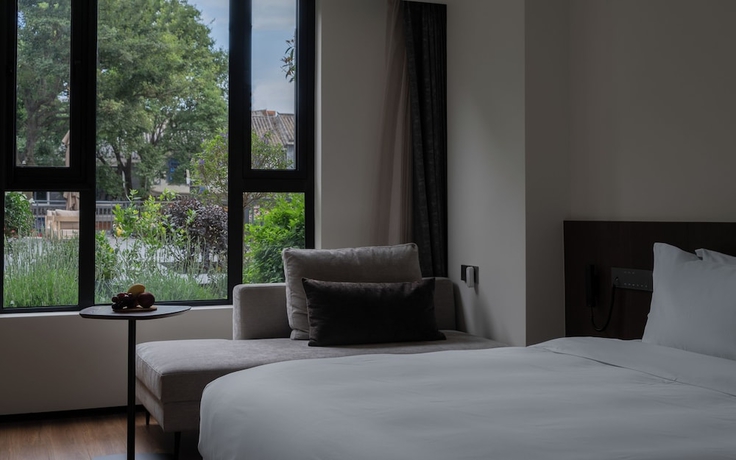 Imagen de la habitación del Hotel Neo-garden. Foto 6