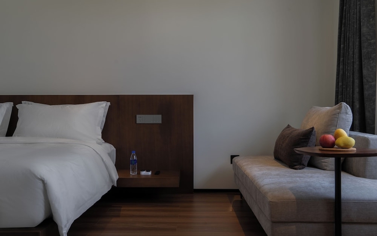 Imagen de la habitación del Hotel Neo-garden. Foto 15