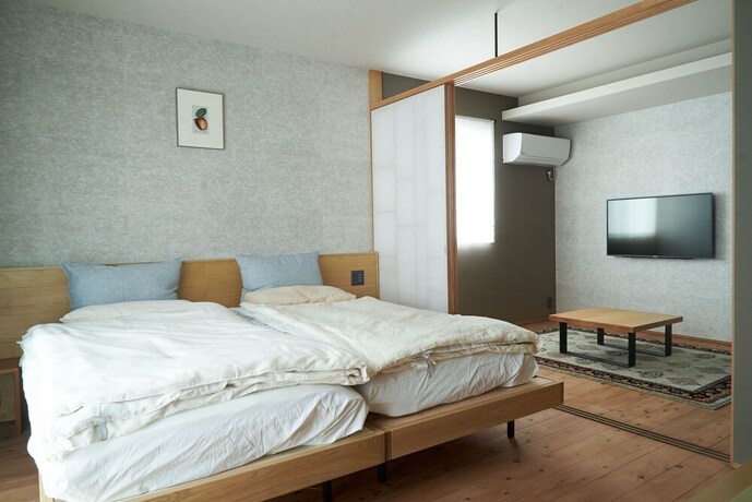 Imagen de la habitación del Hotel Neon, Kanazawa. Foto 28