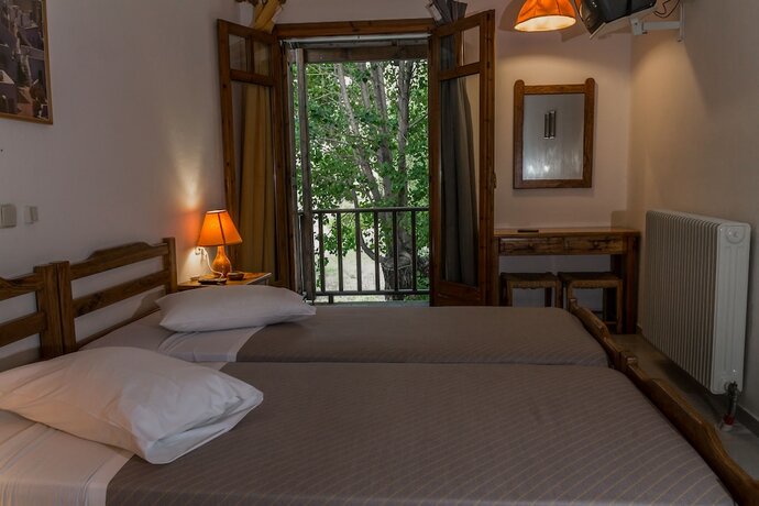 Imagen de la habitación del Hotel Neos Omalos. Foto 19