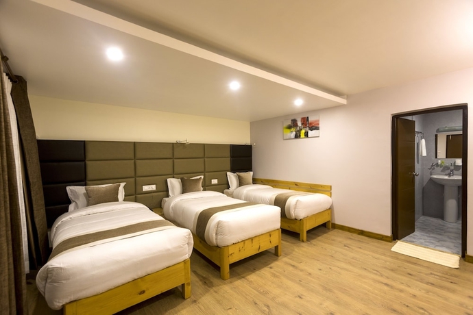 Imagen de la habitación del Hotel Nepal Cottage Resort. Foto 2