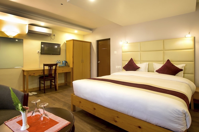 Imagen de la habitación del Hotel Nepal Cottage Resort. Foto 3