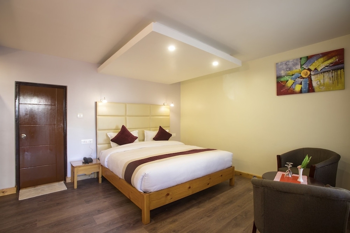 Imagen de la habitación del Hotel Nepal Cottage Resort. Foto 4