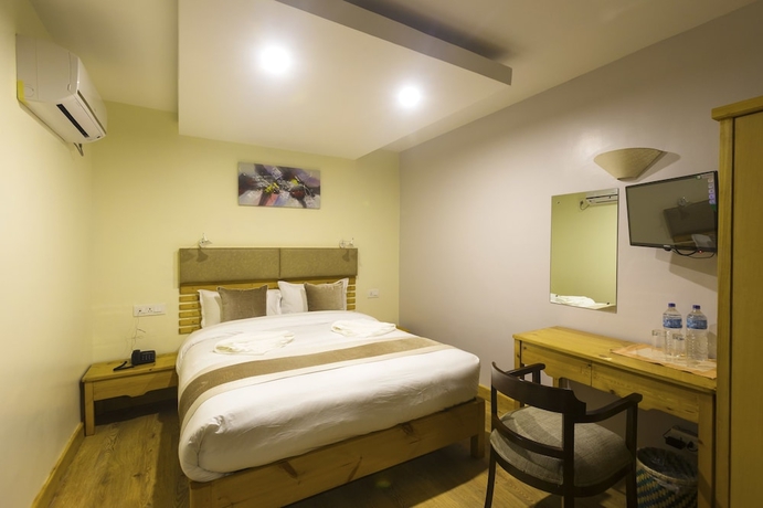 Imagen de la habitación del Hotel Nepal Cottage Resort. Foto 6