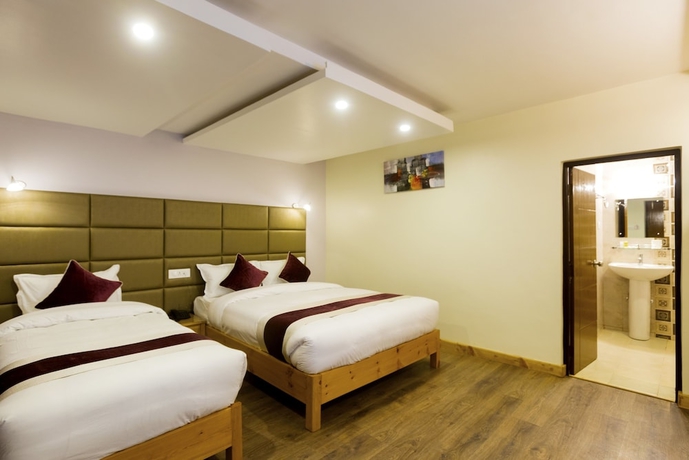 Imagen de la habitación del Hotel Nepal Cottage Resort. Foto 7