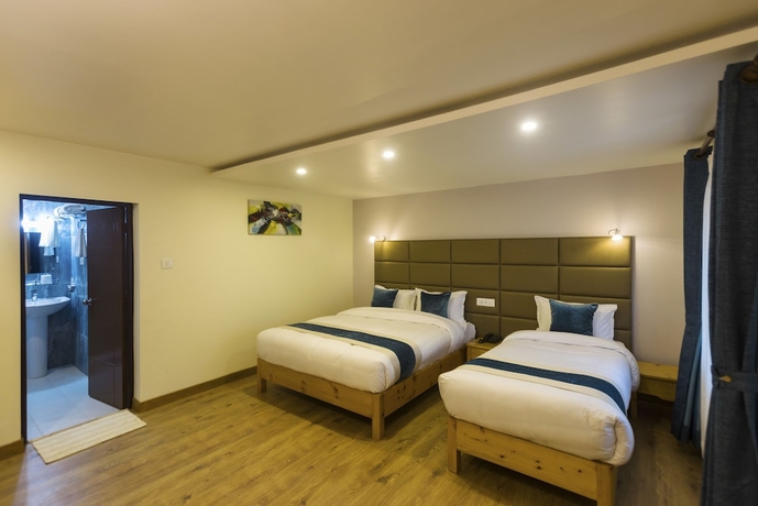 Imagen de la habitación del Hotel Nepal Cottage Resort. Foto 8