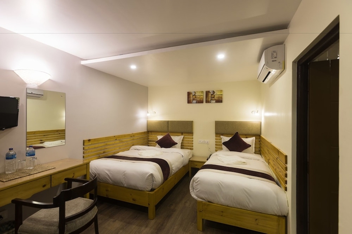 Imagen de la habitación del Hotel Nepal Cottage Resort. Foto 10