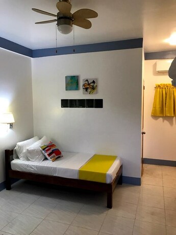 Imagen de la habitación del Hotel Neptune Diving Resort Moalboal. Foto 26