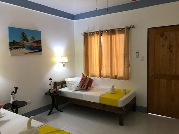 Imagen de la habitación del Hotel Neptune Diving Resort Moalboal. Foto 28