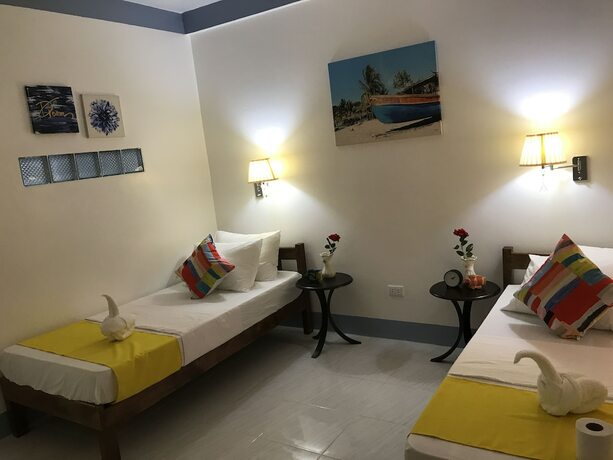 Imagen de la habitación del Hotel Neptune Diving Resort Moalboal. Foto 29